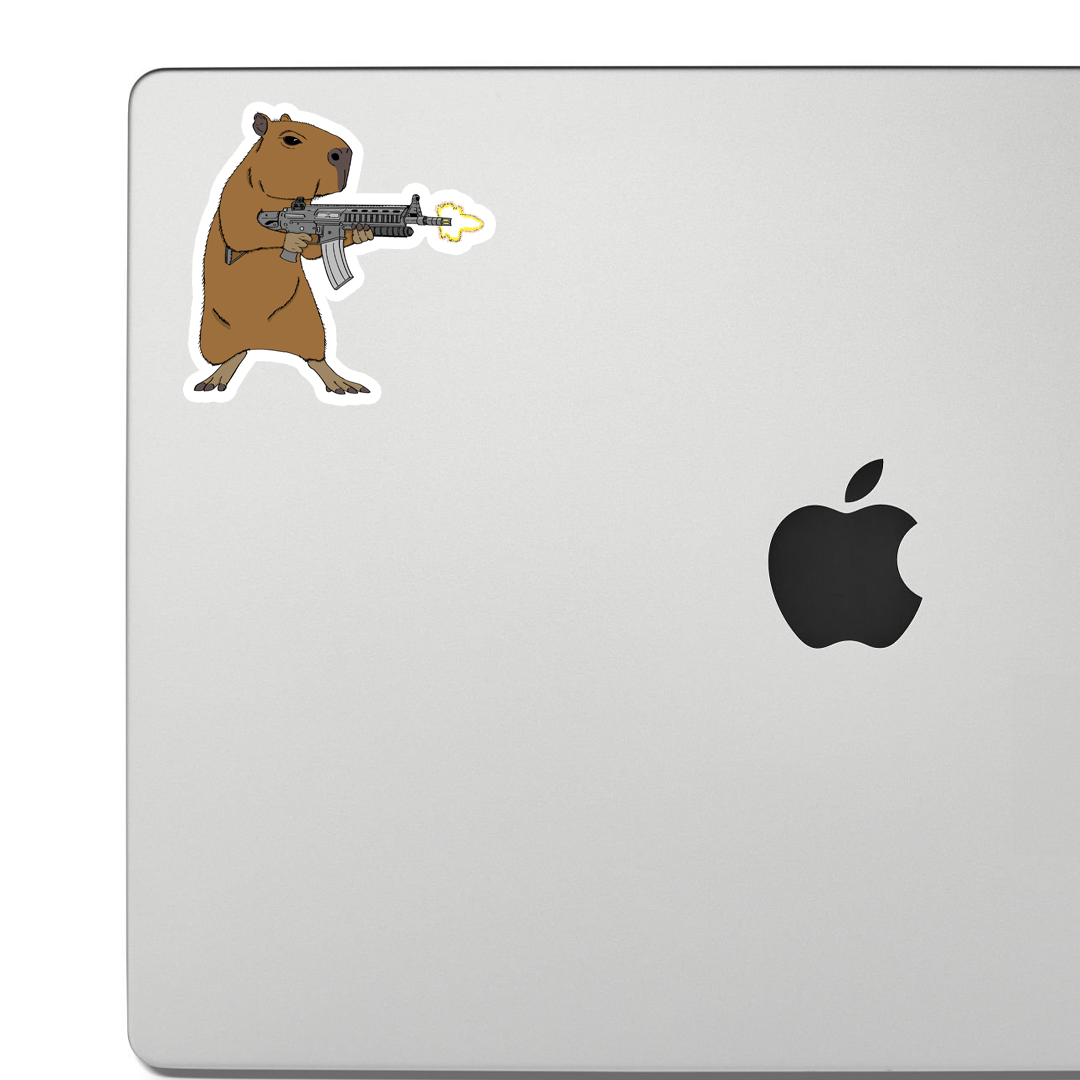 Sticker of a calm capybara firing a large assault rifle, illustrated in a humorous, deadpan combat pose.